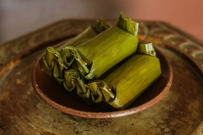 High angle view of vegetables in plate on table