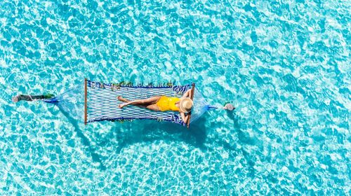 High angle view of swimming in sea
