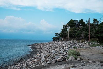 Scenic view of beach against sky