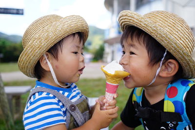 Happy friends eating ice cream