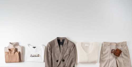 High angle view of wedding dress on white background