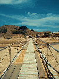 Bridge over land against sky