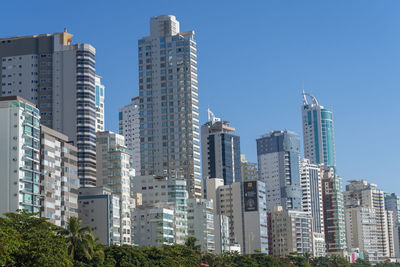 Low angle view of buildings against clear sky