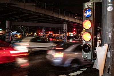 Blurred motion of car on road at night