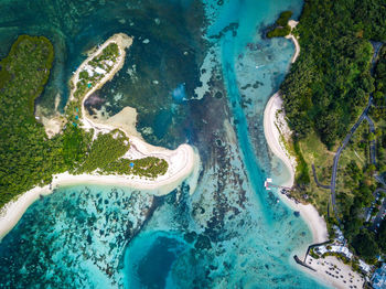 Aerial view of landscape by sea