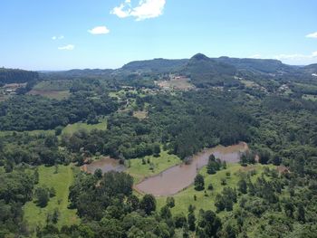 High angle view of trees and mountains against sky