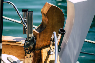 Close-up of bicycle on table by sea