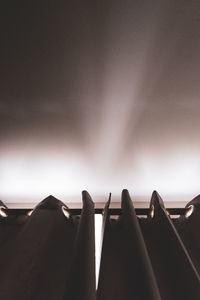 Low angle view of illuminated building against sky