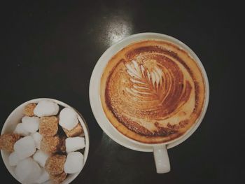 High angle view of cappuccino on table