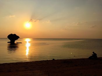 Scenic view of sea at sunset