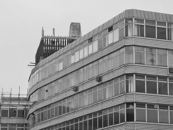 Low angle view of modern building against clear sky