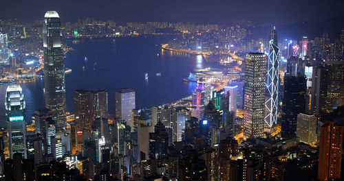 High angle view of illuminated modern buildings in city