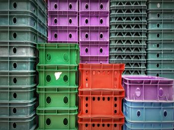 Full frame shot of stacked colorful crates