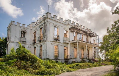 View of building against cloudy sky