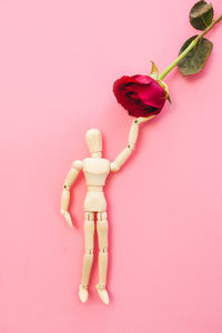 Close-up of stuffed toy against pink background