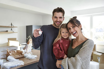 Portrait of happy family at home
