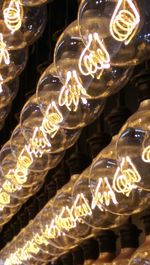 Close-up of illuminated light bulb