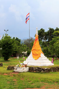 View of statue against trees and sky