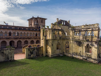 Old historical building against sky in city