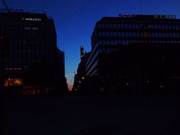 Cars on road at dusk