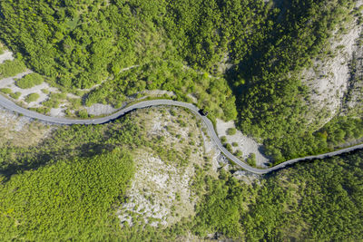 Vertical aerial view of the road that crosses the apuan alps in tuscany