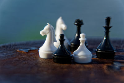 Close-up of chess pieces on table