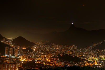 Illuminated buildings in city at night