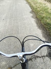 Close-up of car on road