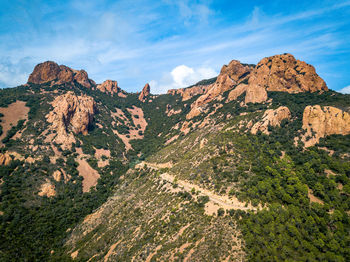 Scenic view of rocky mountains against sky