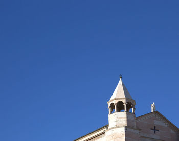 Low angle view of church against clear blue sky