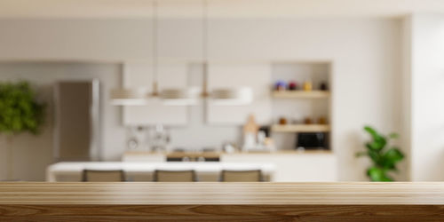 Close-up of wooden table at home