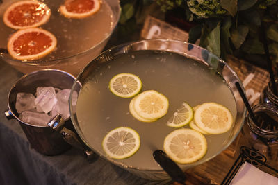 High angle view of fruits in glass on table