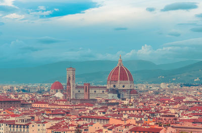 View of red roofs of florence with cattedrale di santa maria del fiore italy