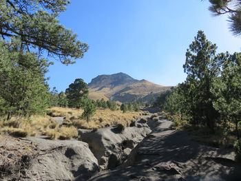 Scenic view of rocky mountains against sky