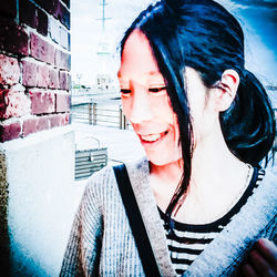 Portrait of smiling young woman