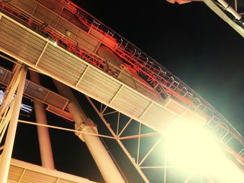 Low angle view of illuminated building against sky