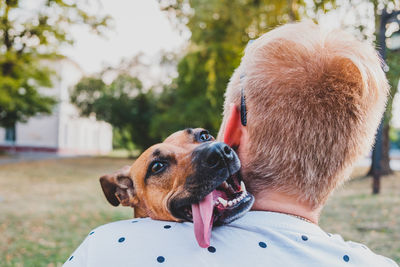 Close-up of dog looking away outdoors