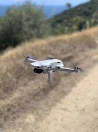 Airplane flying against sky