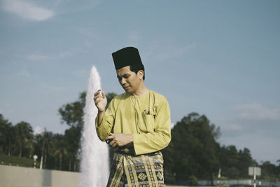 Man standing against sky