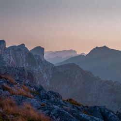 Scenic view of mountains against sky during sunset