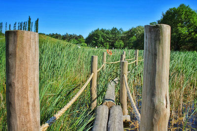 Wooden fence on field