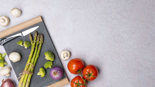 High angle view of chopped vegetables on cutting board