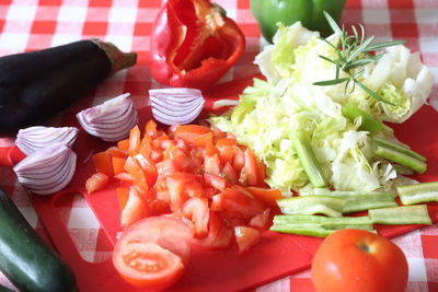 Close-up of chopped fruits in plate on table