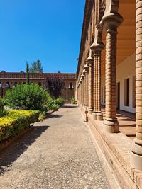Low angle view of a covent  cloister against clear blue sky,  barcelona spain 