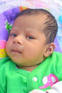 Close-up portrait of cute baby girl