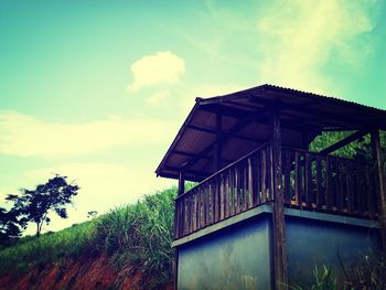 Built structure against cloudy sky