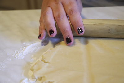 Midsection of woman preparing food