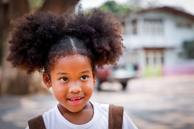 Close-up of girl looking away