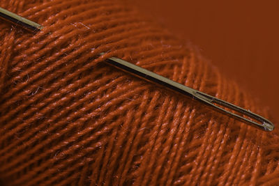 Close-up of sewing needle and thread