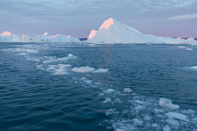 Scenic view of frozen sea against sky